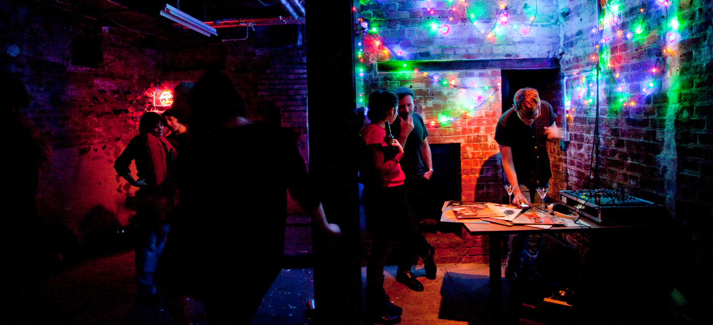 The Ditch room with people and colourful lights